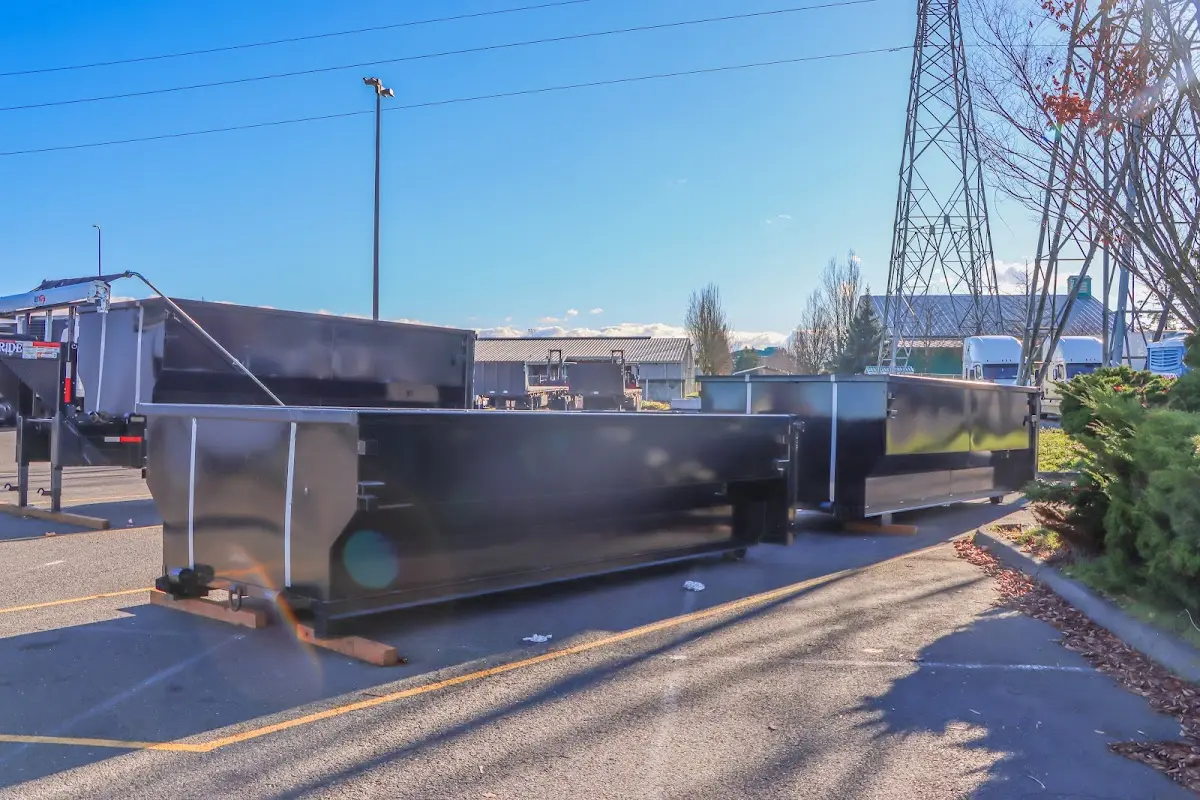 Roll-off dumpster ready for waste disposal at job site for Concrete Dumpster Rental in Campbellsville